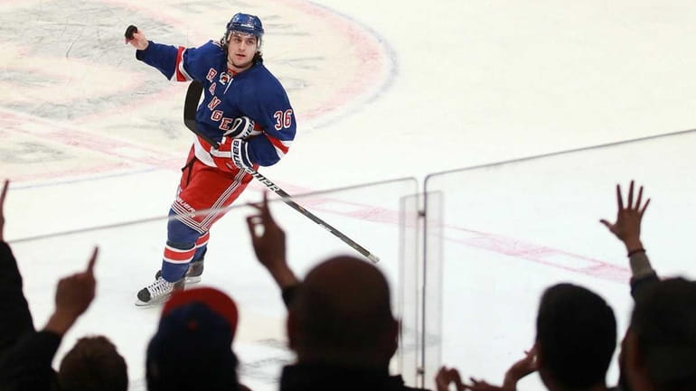 Mats Zuccarello #36 of the New York Rangers salutes the...