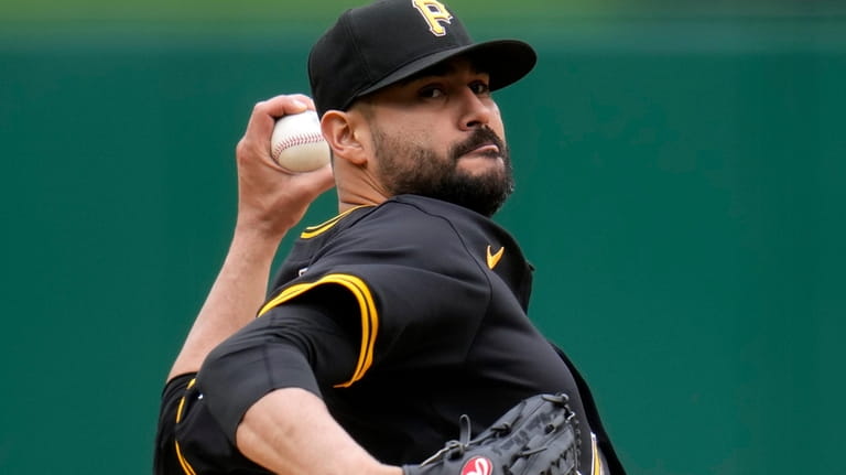 Pittsburgh Pirates starting pitcher Martín Pérez delivers during the first...