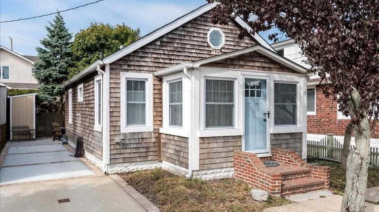 This two-bedroom, one-bathroom cottage in Point Lookout is listed for...