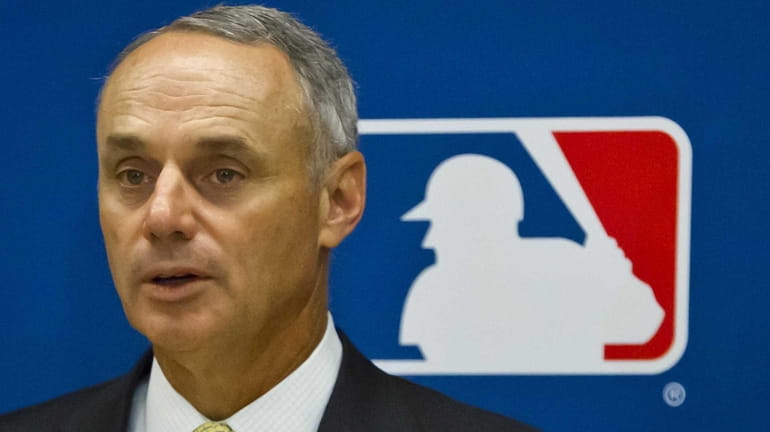 MLB commissioner Rob Manfred speaks during a press conference after...