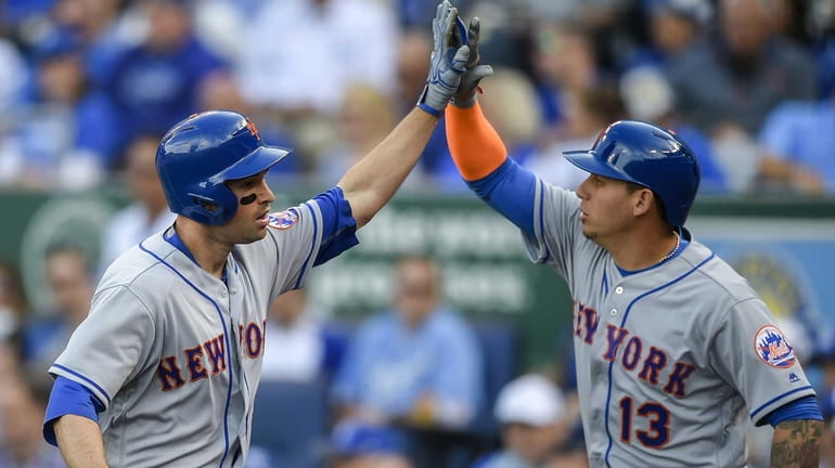 New York Mets second baseman Neil Walker celebrates his two-run...