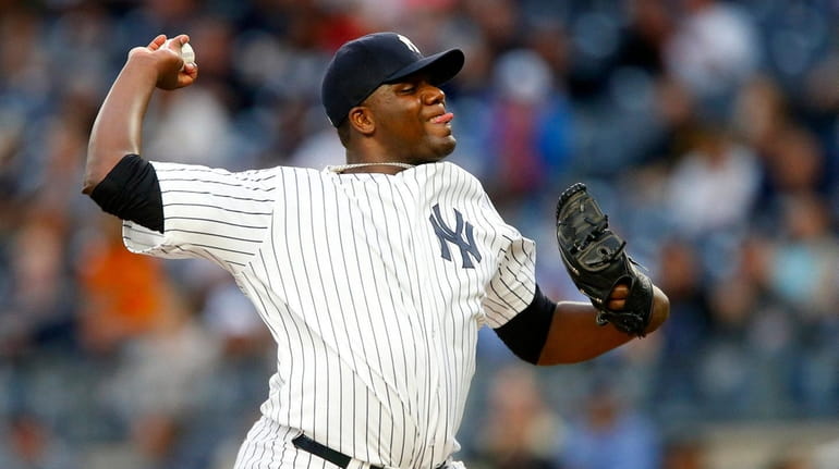 Michael Pineda of the Yankees pitches in the first inning...