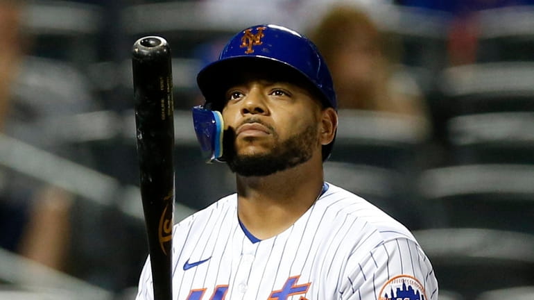 Dominic Smith #2 of the Mets strikes out to end the...