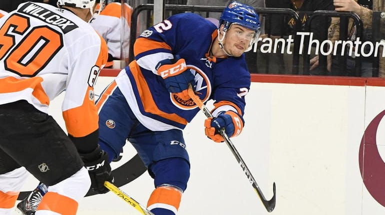 Islanders left wing Anthony Beauvillier shoots the puck against Flyers...