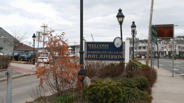 A sign welcomes people to the Village of Port Jefferson....