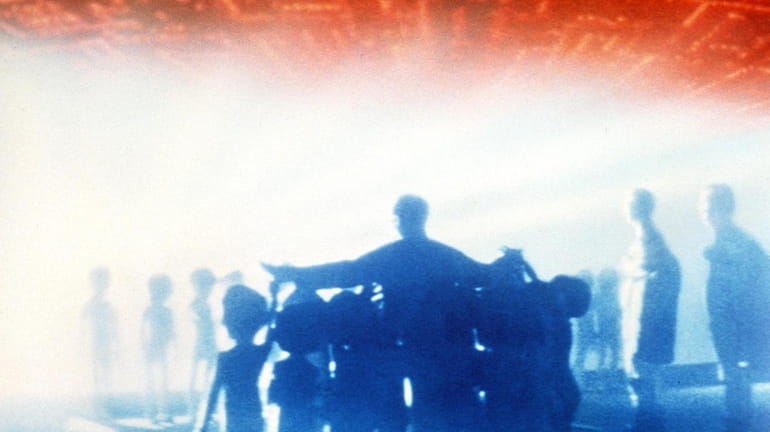 The aliens are landing again in theaters in "Close Encounters...