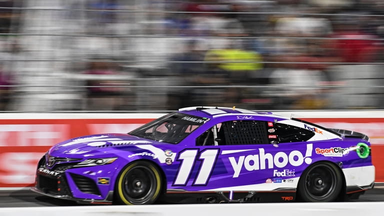 Denny Hamlin (11) competes during the NASCAR All-Star Cup Series...