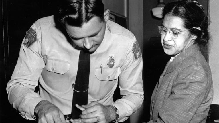 Rosa Parks is fingerprinted by police Lt. D.H. Lackey in...