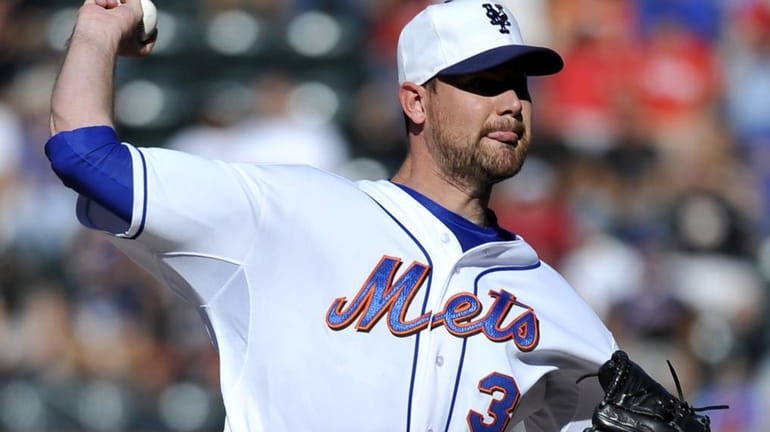 New York Mets starter Mike Pelfry pitches against the Philadelphia...