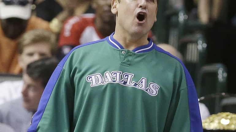 Dallas Mavericks owner Mark Cuban yells from the sidelines during...