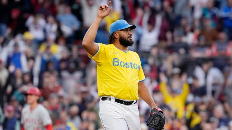 Boston Red Sox's Kenley Jansen reacts after striking out Los...