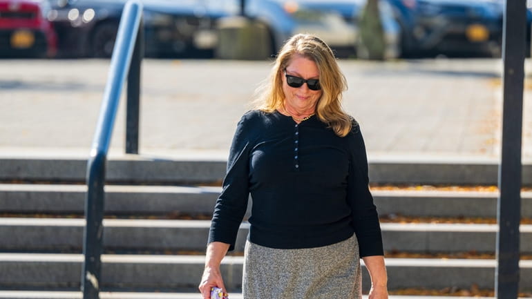 Ann Marie Drago arrives at Suffolk County Court in Riverhead on...