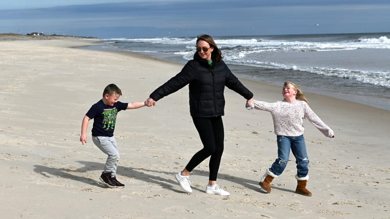 Krista Funfgeld, with her children Colin, 4, and Aubrey, 8, of...