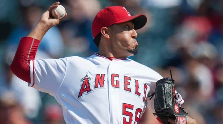 Los Angeles Angels' Fernando Salas pitches in the ninth inning...