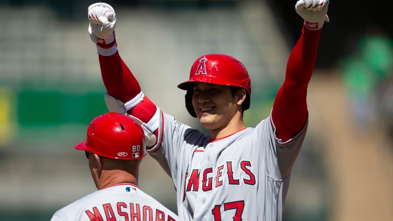 Los Angeles Angels designated hitter Shohei Ohtani (17) celebrates after...