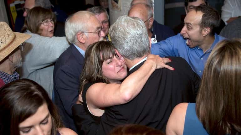 Democrat Christine Pellegrino is emotional as she hugs Suffolk County...
