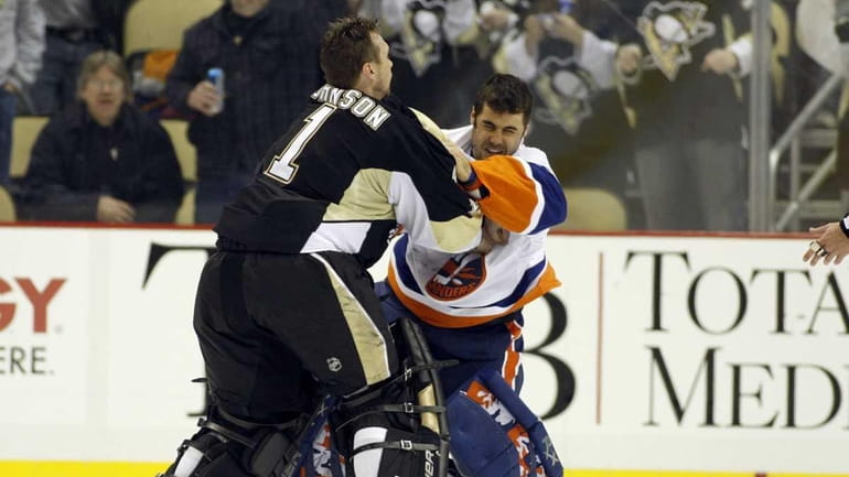 Brent Johnson #1 of the Pittsburgh Penguins gets in a...