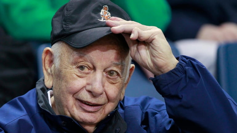 FILE - Former Princeton basketball coach Pete Carril tips his...