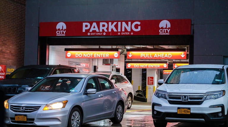 With free parking scarce in the city, paid garages like this...