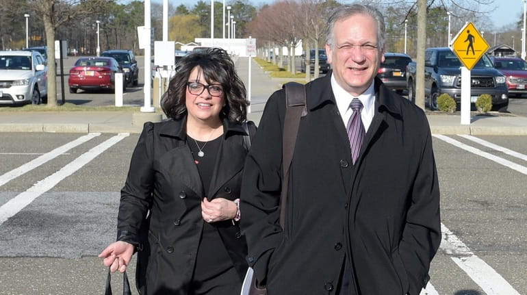 Linda and Edward Mangano arrive at the federal court in...