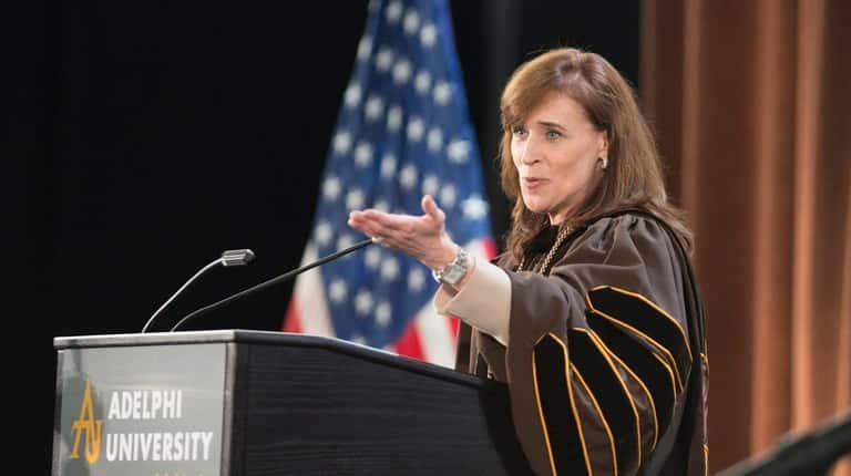 Christine M. Riordan, Ph.D. speaking during her inauguration as Adelphi...