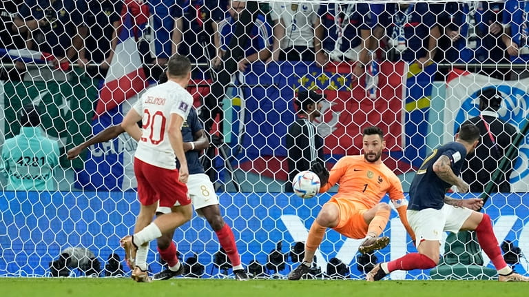 France's goalkeeper Hugo Lloris saves a ball during the World...