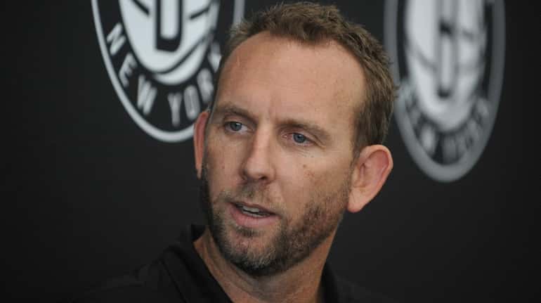 Nets general manager Sean Marks speaks with the media at...