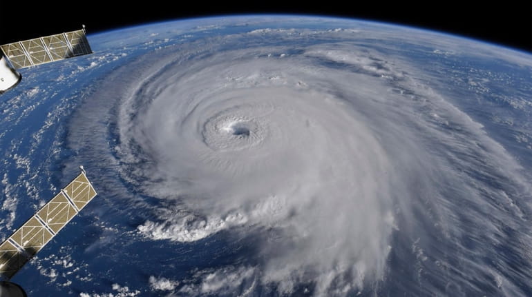 Hurricane Florence, seen from the International Space Station, threatens the...