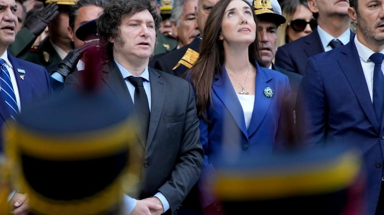 Argentine President Javier Milei, left, and his Vice President Victoria...