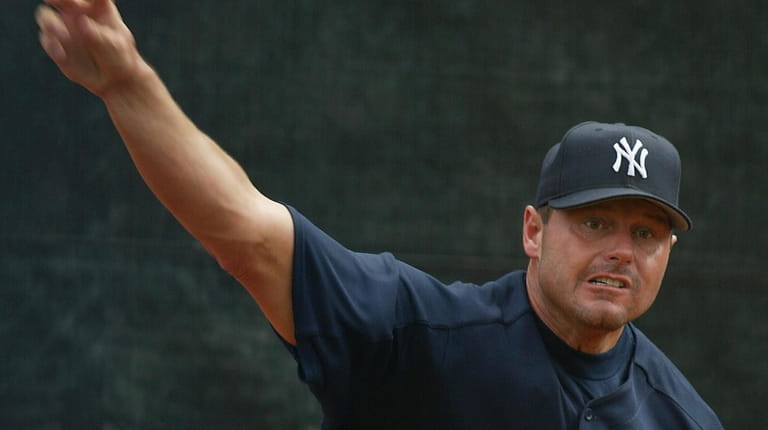 Yankees pitcher Roger Clemens fires a pitch in the bullpen...