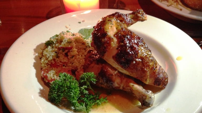 The exceptional rotisserie chicken at Houston's at Roosevelt Field (Sept.,...