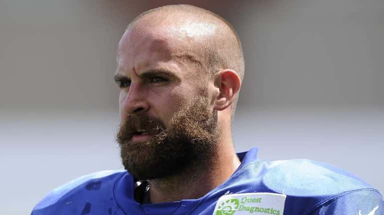 Giants safety Tyler Sash looks on during training camp on...