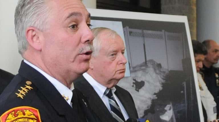 Suffolk's then-police chief James Burke, left, and then-DA Thomas Spota give...