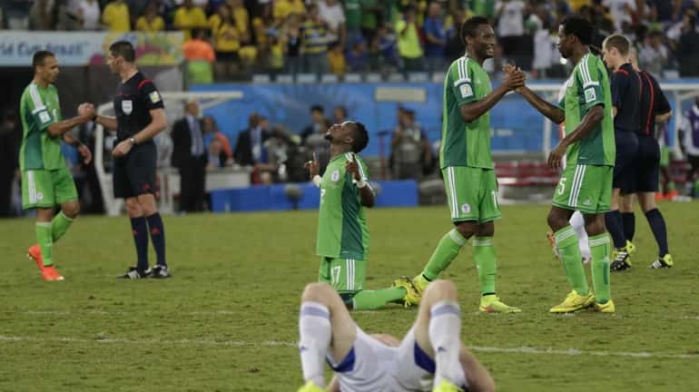 Nigeria celebrates after the Group F World Cup soccer match...