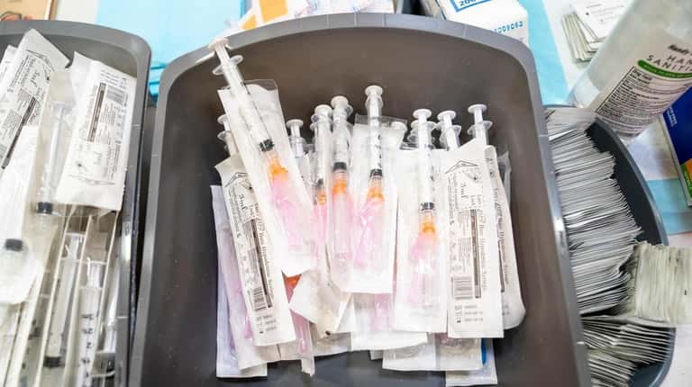 Moderna COVID-19 vaccines are delivered to Eastport-South Manor Junior-Senior High School...