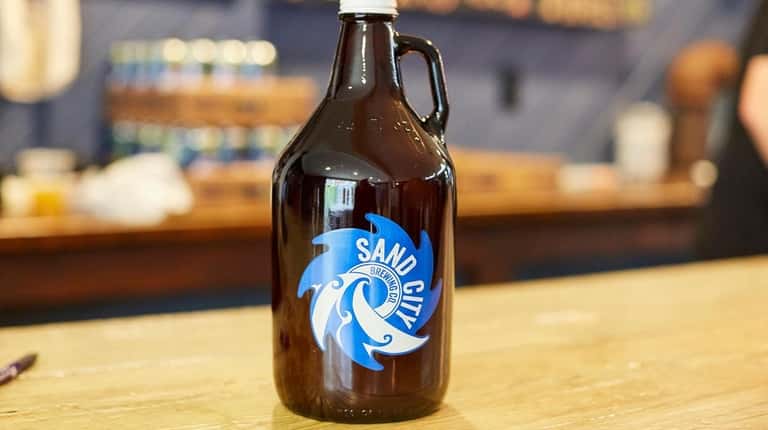 A growler to-go from Sand City Brewing Co. in Northport.
