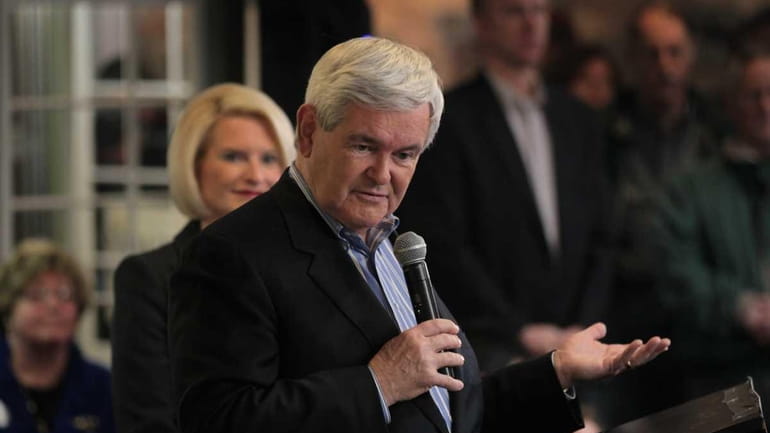 Former Speaker of the House Newt Gingrich speaks to guests...