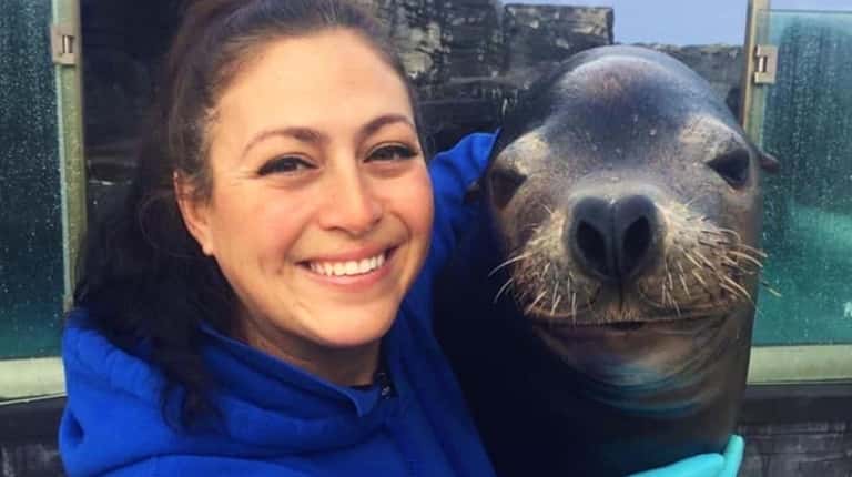 The Long Island Aquarium's Senior Mammal Trainer and Caregiver Nicole...