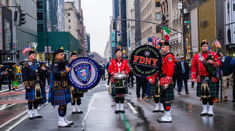 NYPD and FDNY bands march in the St. Patrick's Day...
