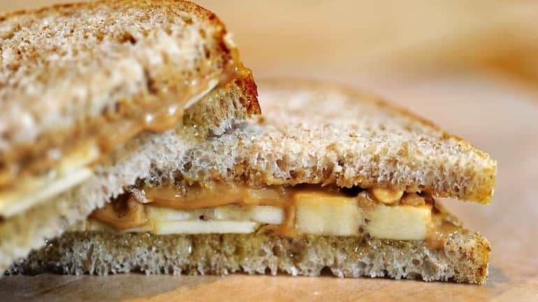 Peanut butter, honey and bananas on white whole wheat bread...