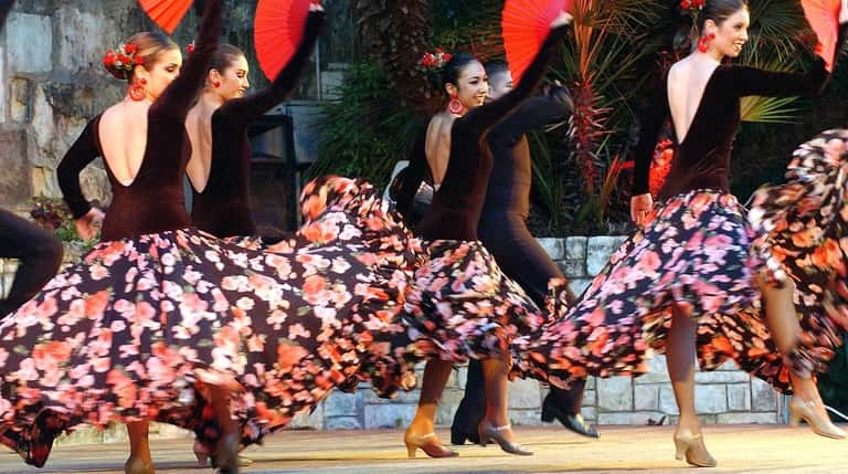 Latin dancers perform during Fiesta Noche del Rio at the...