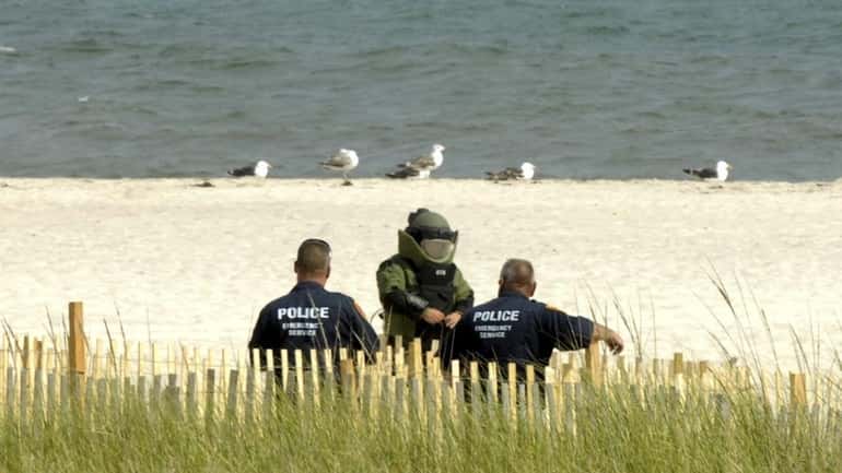 A Suffolk County Emergency Services unit investigates a "Navy-type military...