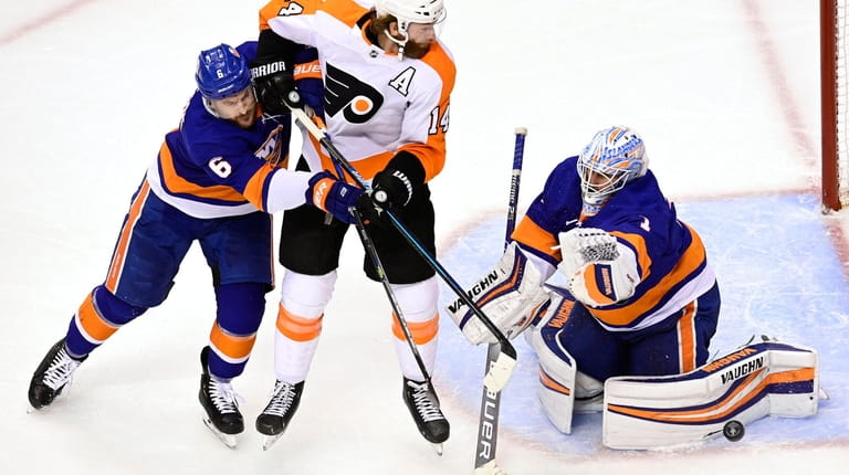 Islanders goaltender Thomas Greiss (1) makes a save as Philadelphia...