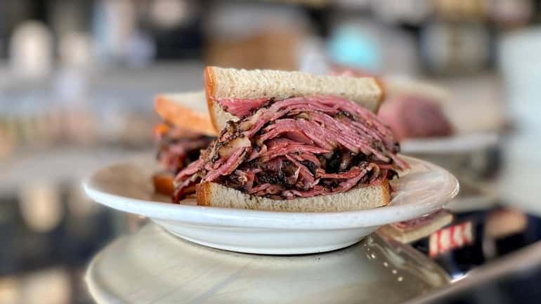 A pastrami sandwich awaits pick-up at Lido Kosher Deli in...