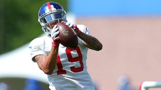 Giants wide receiver Myles White catches a pass during training...