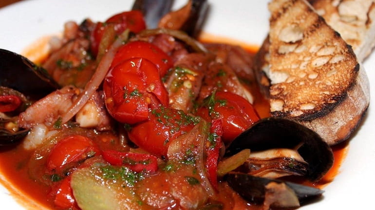 Cacciucco Livornese, a seafood stew, is one of the courses...