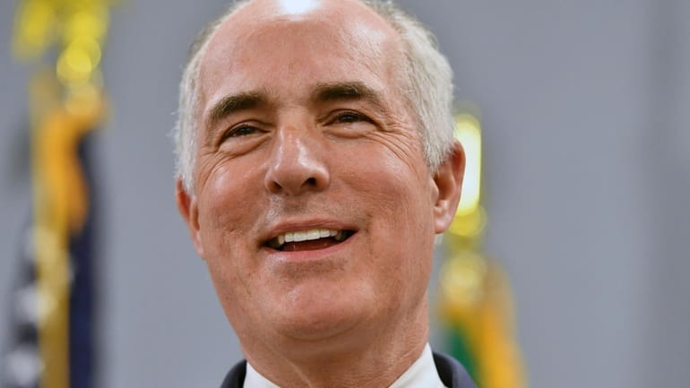 Sen. Bob Casey, D-Pa., smiles while speaking during an event...