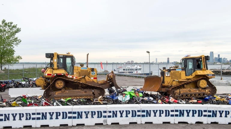 The NYPD crushed dozens of seized dirt bikes and ATVs...