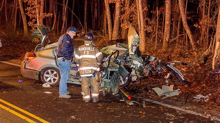 Firefighters respond to a crash at 2:30 a.m. Tuesday, Dec....