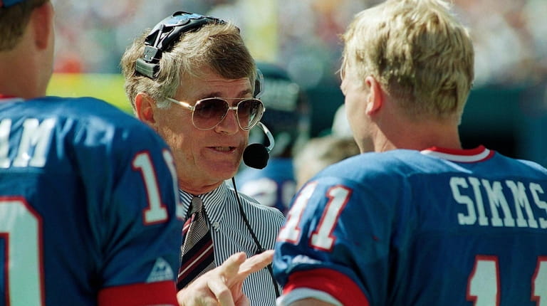 Giants head coach Dan Reeves gives some instructions to his...